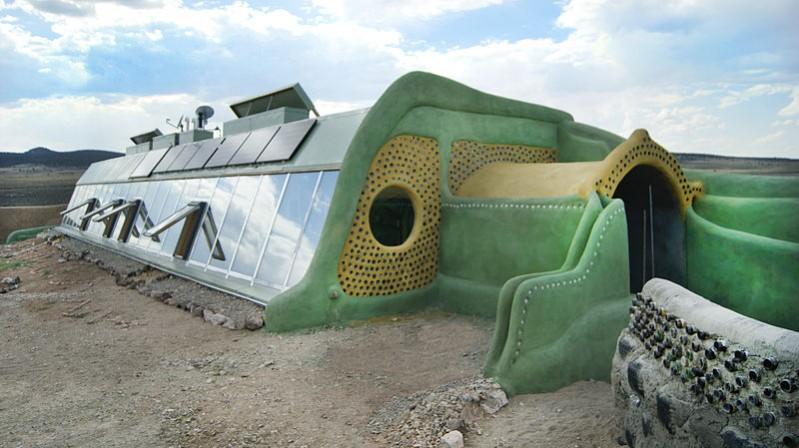 South and east side of an Earthship passive solar home. Nature house