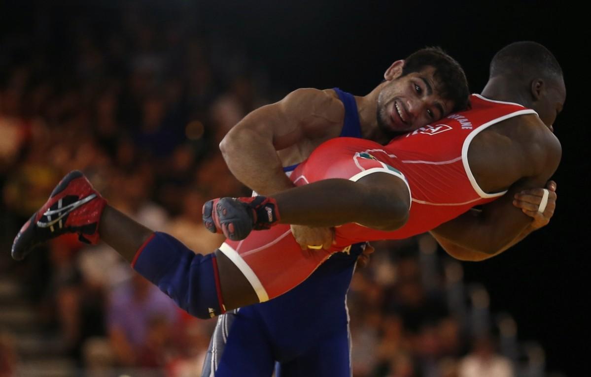 Amit Kumar defeated Nigeria's Ebikweminomo Welson in 57 kg freestyle final to win gold. Amit Kumar
