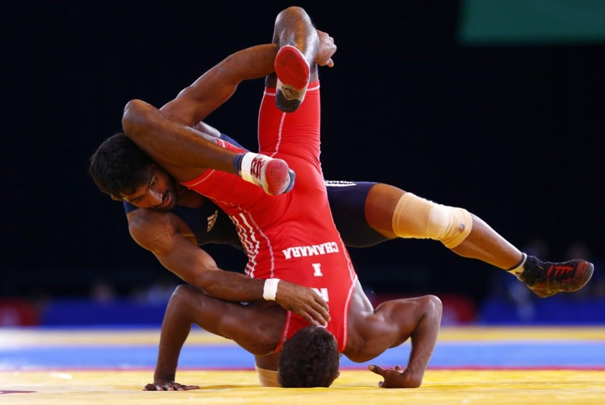 Yogeshwar Dutt thrashed his Canadian opponent in the final of 65 kg freestyle to clinch gold for India in wrestling. Yogeshwar Dutt