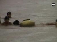 nearly-100-students-in-gujarat-forced-to-swim-to-school-daily