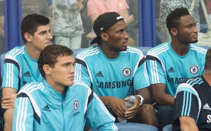 Chelsea players look on from the bench during the Blues pre-season clash against Werder Bremen Chelsea