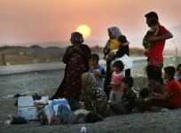 Thousands have fled the Sinjar town as Islamic State militants forced the Kurdish forces guarding the frontiers to retreat.
