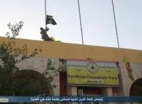 ISIS militant hoists flag in Sinjar