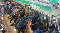 trapped-commuter-freed-after-australians-tilt-train
