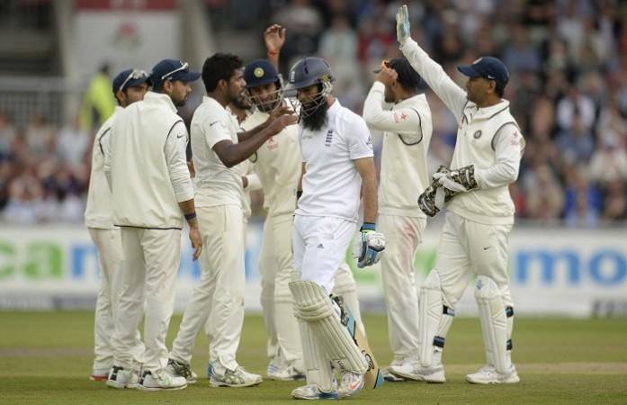 India fast bowler Varun Aaron celebrates with teammates after dismissing England batsman Moeen Ali during the second day of the fourth Test Varun Aaron India Moeen Ali England