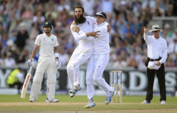 England spinner Moeen Ali celebrates with teammate Joe Root after dismissing India No.3 Cheteshwar Pujara during Day 3 of the fourth Test Moeen Ali Joe Root England