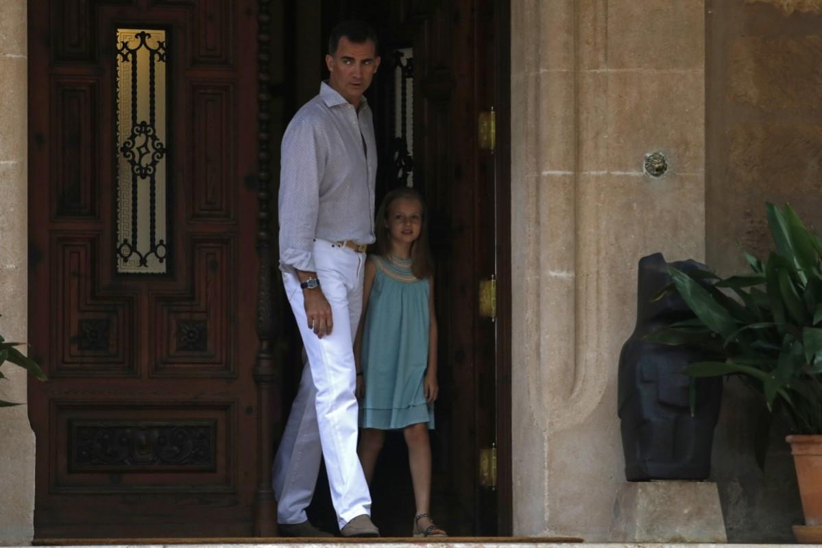 Spain's King Felipe VI and Princess Leonor arrive for the photocall at Marivent Palace in Palma de Mallorca. King and princess