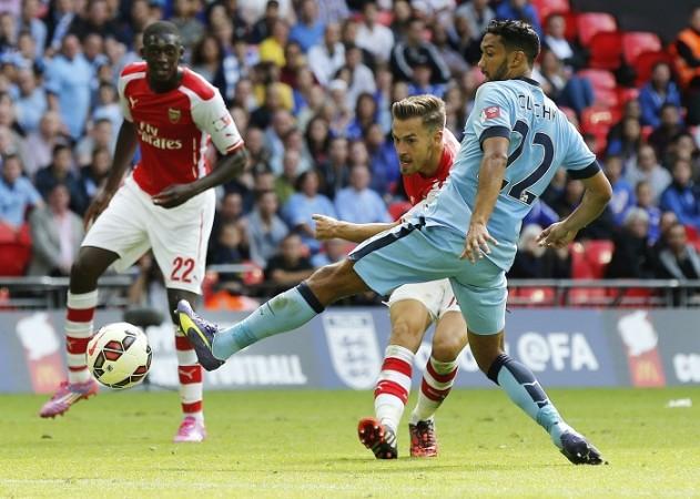 Arsenal midfielder Aaron Ramsey scores against Manchester City in the Communuty Shield Aaron Ramsey Yaya Sanogo Arsenal Gael Clichy Manchester City