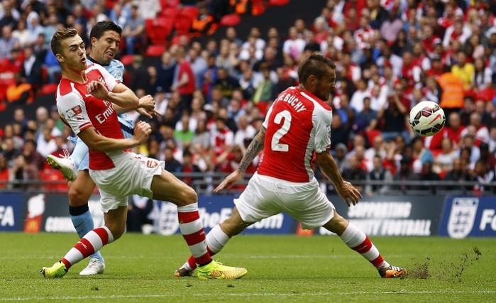 Arsenal defenders Calum Chambers and Mathieu Debuchy caught the eye with their performances against Manchester City in the Community Shield Samir Nasri Manchester City Calum Chambers Mathieu Debuchy Arsenal