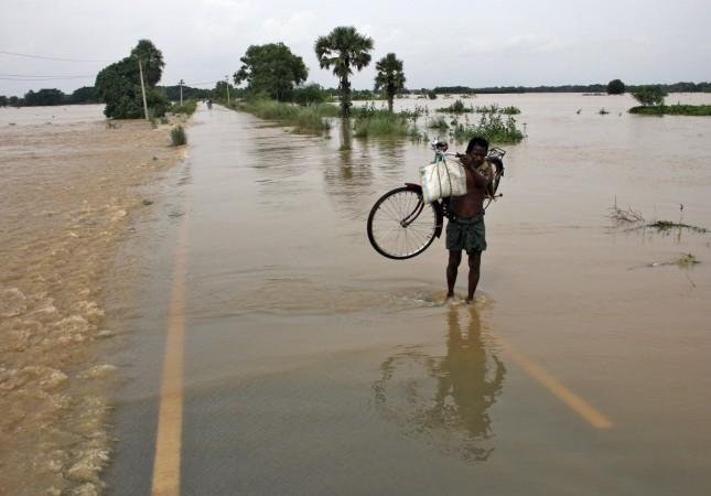 Flood water in Odisha is receding slowly due to tidal waves in the sea. Odisha flood