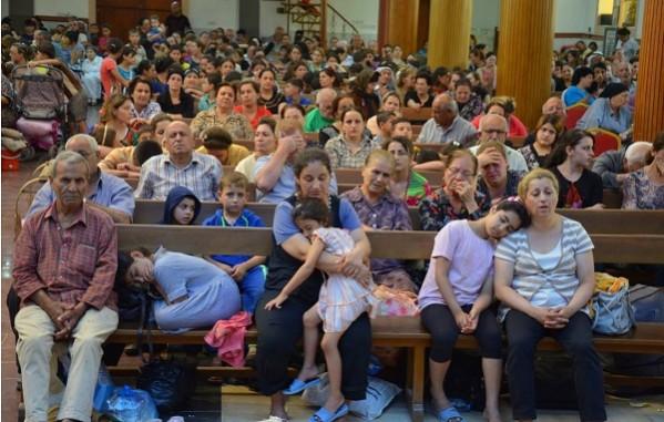 Refugees in a church in Erbil Refugees in a church in Erbil
