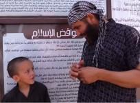 A Belgian ISIS militant with his son in Syria