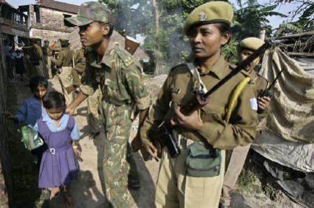 Paramilitary soldiers patrol Nandigram village in this November 21, 2007 file photo. Nandigram Violence