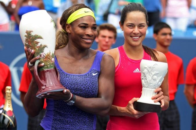Serena Williams and Ana Ivanovic during the trophy presentation of the Cincinnati Masters. Serena Williams and Ana Ivanovic