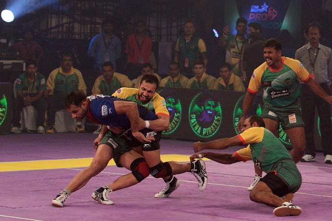 A still from an action-packed match at the Pro Kabaddi League 2014 Pro Kabbadi League