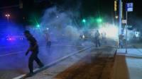 police-fire-tear-gas-to-disperse-ferguson-crowd