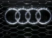 The company logo is seen on the bonnet of a Audi car during the media day ahead of the 84th Geneva Motor Show at the Palexpo Arena in Geneva March 5, 2014.