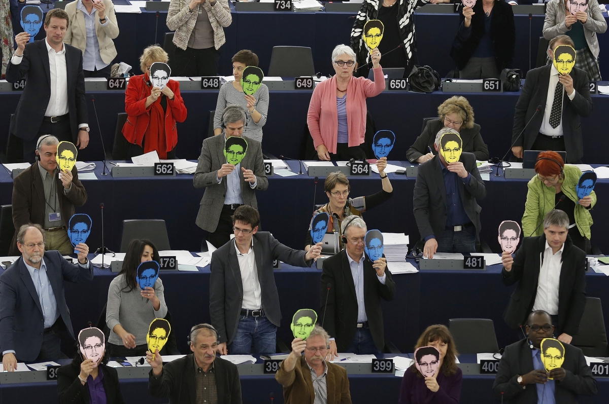 Strasbourg, France
Members of the group of the Greens/European Free Alliance of the European Parliament hold differently coloured portraits of former U.S. spy agency NSA contractor Edward Snowden, during a voting session on the U.S. National Security Agency (NSA) surveillance programme and its impact on the fundamental rights of European Union (EU) citizens, at the European Parliament in Strasbourg, March 12, 2014. World Photography day