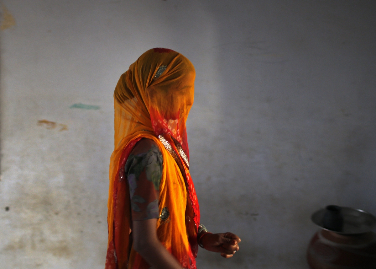 Ajmer, IndiaA woman leaves after casting her vote inside a polling station in Ajmer district in the desert Indian state of Rajasthan April 17, 2014. India kicked off the biggest day of its mammoth general election on Thursday, with a quarter of its 815 million voters set to head to the polls during a week of fresh blows for the ruling Congress party and gains for the Hindu nationalist opposition. World Photography day