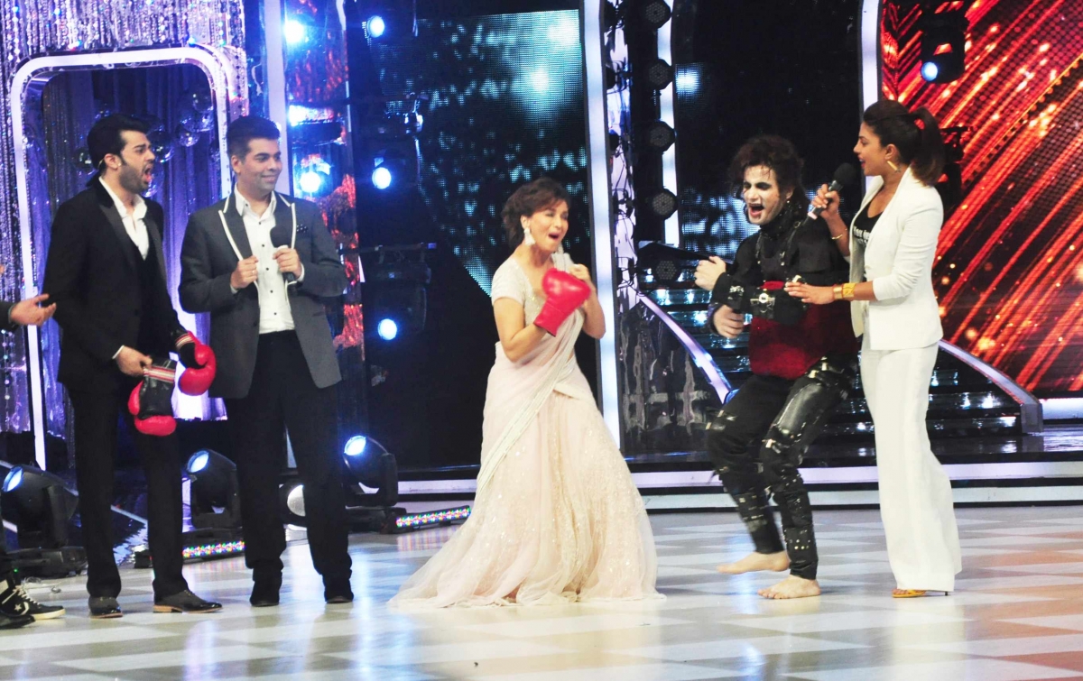 Madhuri Dixit also punches Karan. Priyanka Chopra promotes Mary Kom on Jhalak Dikhhla Jaa