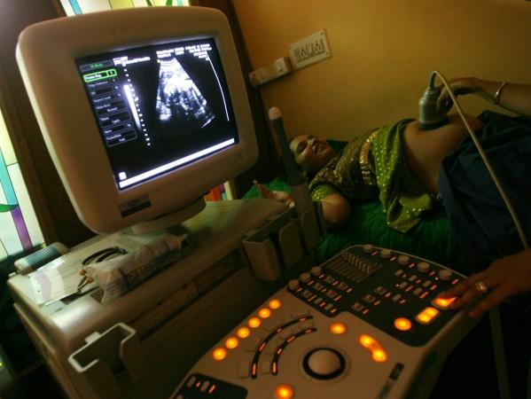 Ultrasound examination of a pregnant woman pregnant woman getting ultrasound