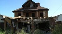 artillery-pounding-leaves-donetsk-residential-street-in-ruins