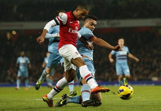 West Ham defender Winston Reid is an Arsenal target Theo Walcott Winston Reid Arsenal West Ham