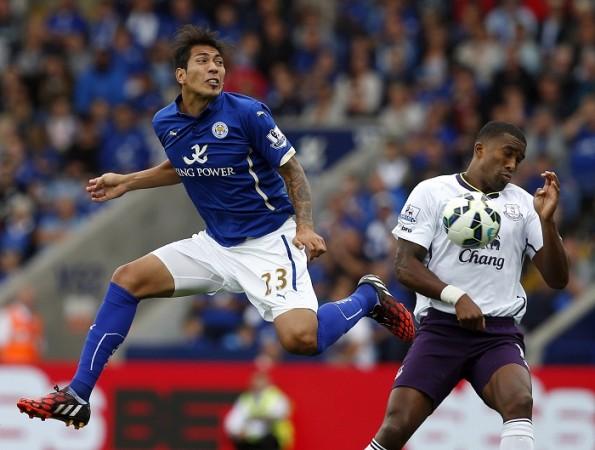 Leonardo Ulloa, seen here fighting for the ball with Everton defender Sylvain Distin, will hope to find the goal when Leicester City visit Chelsea Leonardo Ulloa Leicester City Sylvain Distin Everton