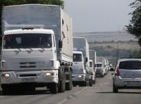 Russian aid convoy of nearly 300 trucks entered the Ukrainian border despite Kiev's objection as reports of artillery fired inside Ukraine.
