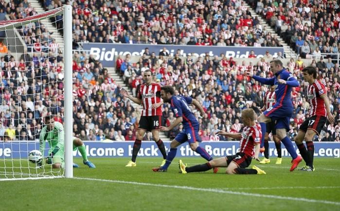 Manchester United playmaker Juan Mata scores against Sunderland in their English Premier League game Juan Mata Manchester United Sunderland