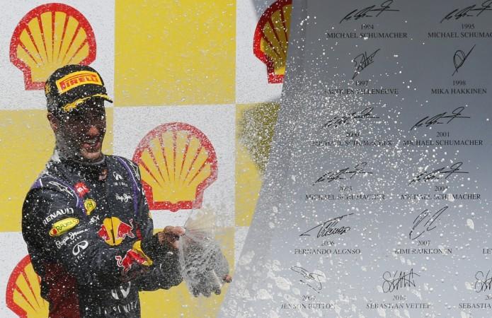 Red Bull Racing's Daniel Ricciardo celebrates after winning the Belgian Grand Prix in Spa-Francorchamps. Daniel Ricciardo