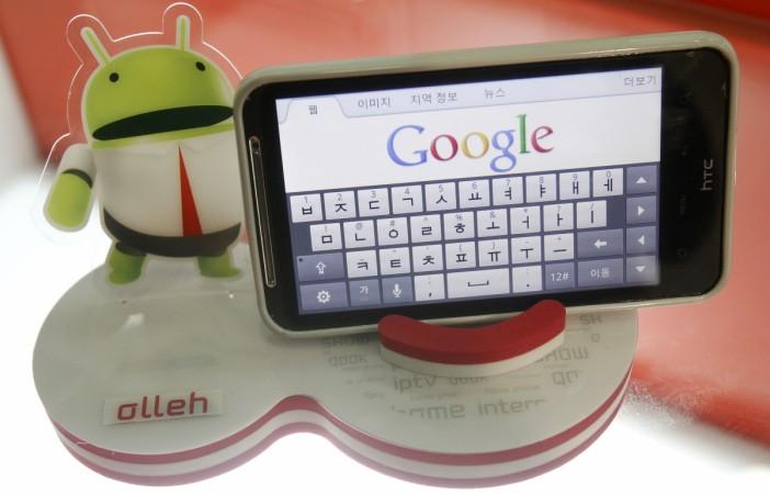 An Android smartphone displays the Google website. Google