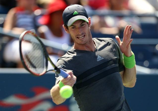 Andy Murray hits a return to Robin Haase during their match first round match at the US Open. Andy Murray