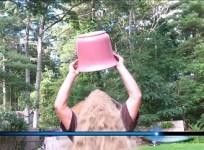 An American citizen participates in the Rubble Bucket challenge in support of Gaza victims.