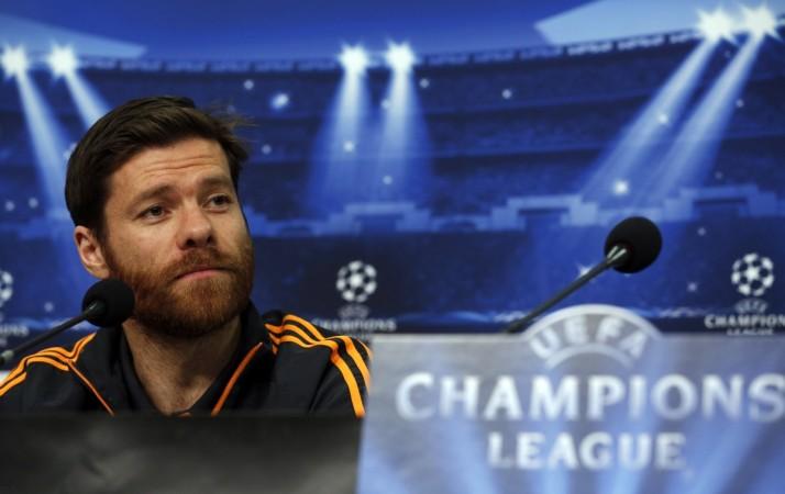 Real Madrid's Xabi Alonso addresses a news conference in Gelsenkirchen. Xabi Alonso