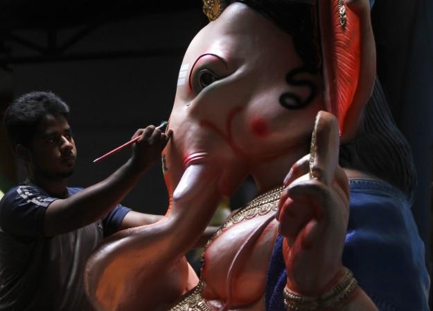 The elephant god Ganesh is the deity of prosperity and artisans start sculpturing his idols two to three months prior to Ganesh Chathurthi. When it comes to buying a Ganpati idol for the festival, most devotees are choosy and the selection is confirmed only after checking out the trunk on the idol. Ganesha idols come with three kinds of trunks- trunk curved towards left or Vamamukhi Vinayak, another with trunk curved towards right or Dakshin Murti and third one with a straight trunk curved upwards, or Sushumna; all auspicious in their own right. An artisan works on an idol of Ganesh