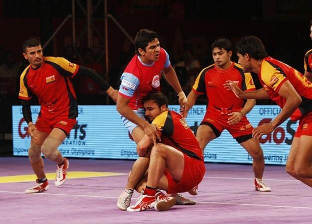 The Bengaluru Bulls (red and yellow) will look to stop U Mumba in the Pro Kabaddi League semifinal Bengaluru Bulls Jaipur Pink Panthers
