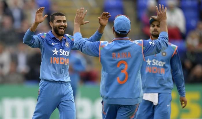 Ravindra Jadeja and Suresh Raina celebrate an England wicket in the 2nd one-day international Ravindra Jadeja Suresh Raina India