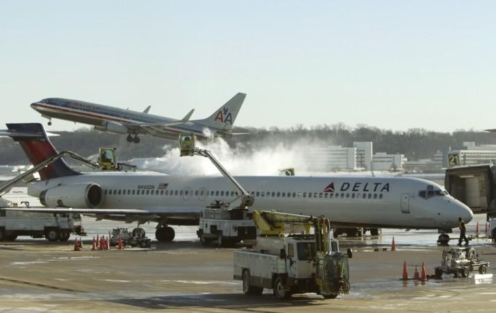 Delta Airlines flight diverts as passenger fight over reclining seats Delta Airline