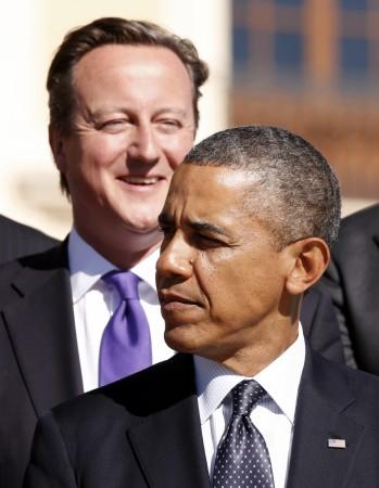 British Prime Minister David Cameron and US President Barack Obama, in a joint statement, vowed to 'confront' the Islamic State. The British Prime Minister David Cameron and US President Barack Obama, in a joint statement, vowed to 'confront' the Islamic State.