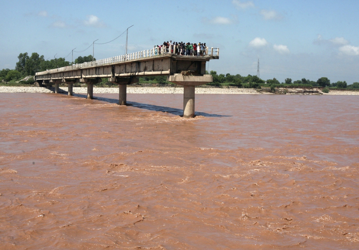 People stranded on a bridge that was washed away in the flood Kashmir Floods