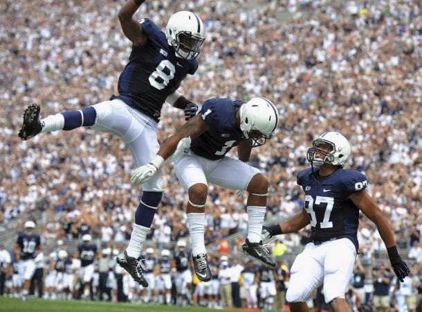 Penn State's Allen Robinson (8), Bill Belton (1) and Kyle Carter (87) celebrate Belton's first touchdown against Ohio University during their NCAA football game in State College, Pennsylvania. Pen State football team