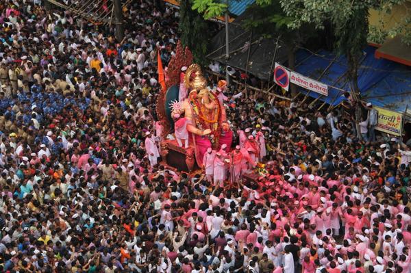 Amitabh Bachchan posts a photo of a crowded procession. Ganpati Visarjan 2014