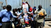 pro-aristide-haitians-mark-st-jean-bosco-massacre