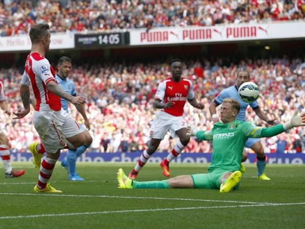 Arsenal midfielder Jack Wilshere scores the equaliser against Manchester City Arsenal Jack Wilshere