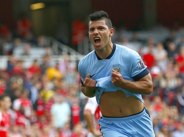 Manchester City striker Sergio Aguero celebrates scoring the opener against Arsenal Sergio Aguero Manchester City