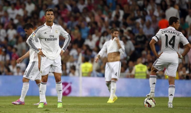 Real Madrid's James Rodriguez (L-R), Cristiano Ronaldo, Sergio Ramos and Javier Real Madrid