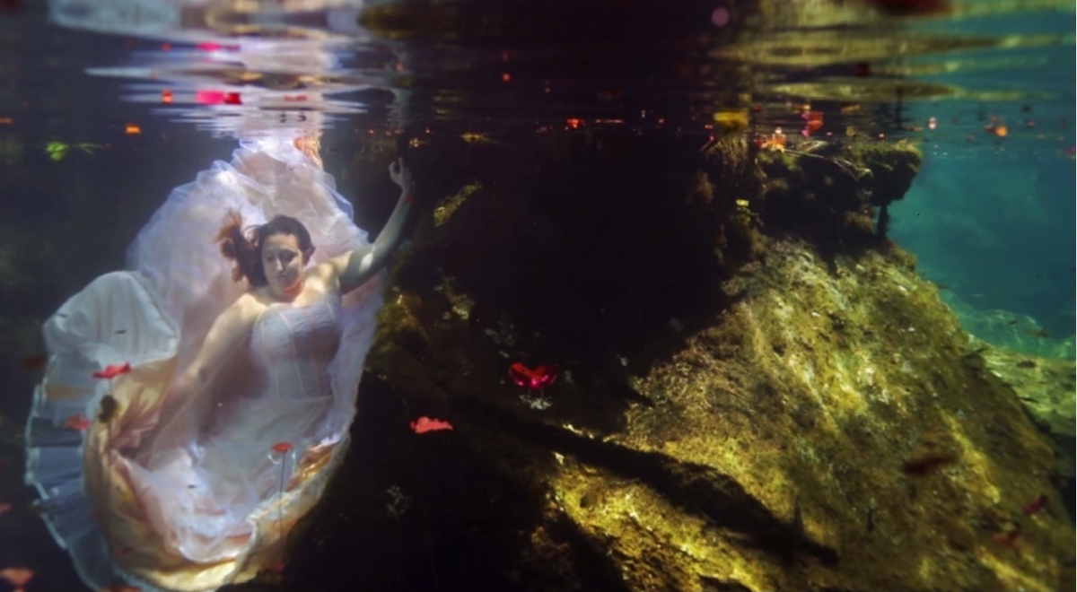 Janine's beautiful handmade wedding dress was no longer a symbol of happiness but instead was a painful reminder of what she had lost, but in water it became so light and free. Wedding Day That Never Happened