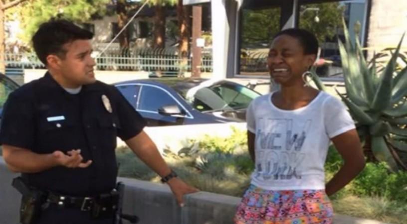 Daniele Watts handcuffed and detained by the police when she was seen kissing her white boyfriend in car