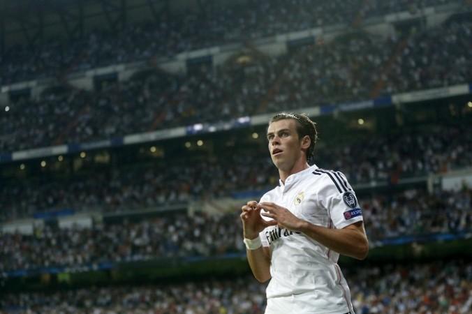 Real Madrid forward Gareth Bale celebrates after scoring against Basel in the Champions League Real Madrid Gareth Bale
